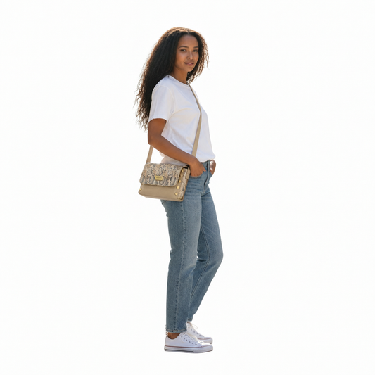Model wearing the beige Willow Textured Leather Crossbody Bag